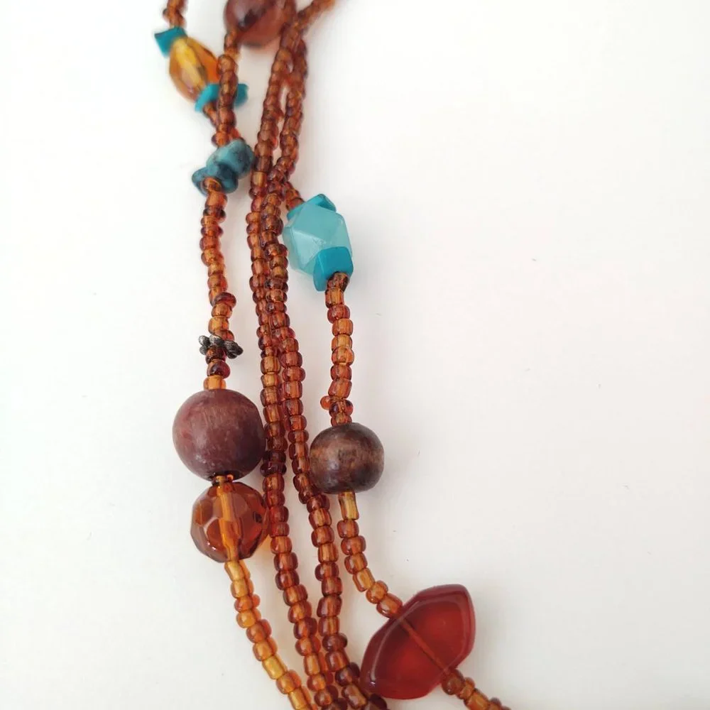 Amber and blue tones-seed bead and wood bead multi strand necklace